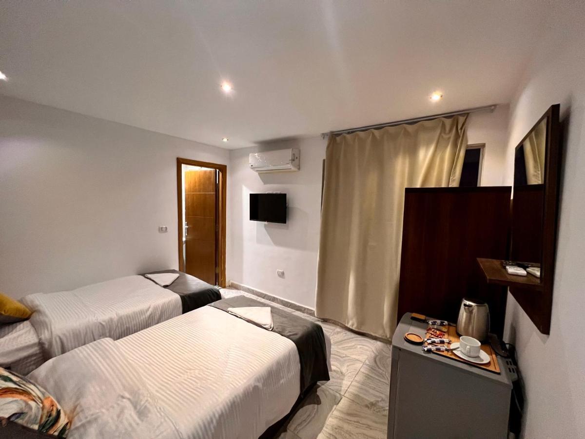Grand Pyramids Inn Kafret el-Gabal Kültér fotó