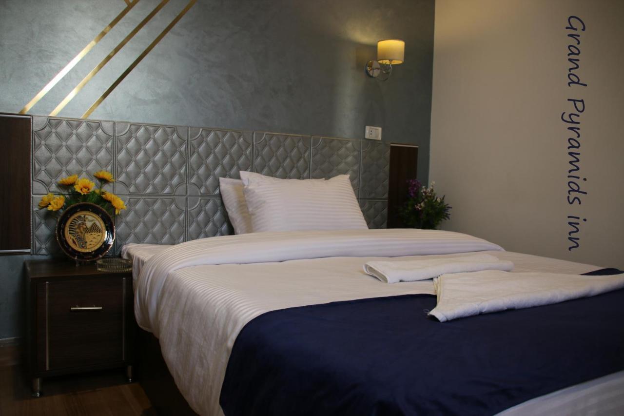 Grand Pyramids Inn Kafret el-Gabal Kültér fotó