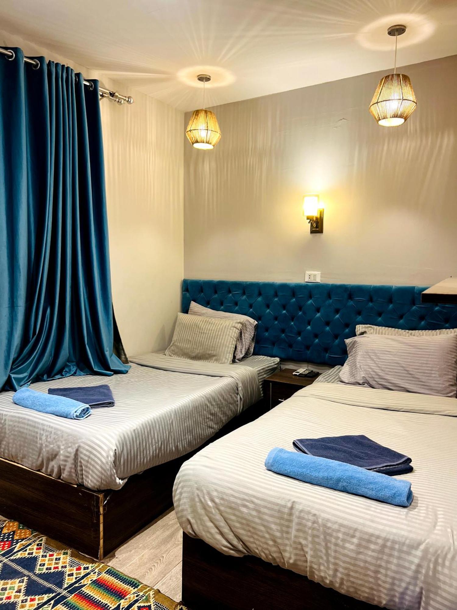 Grand Pyramids Inn Kafret el-Gabal Kültér fotó
